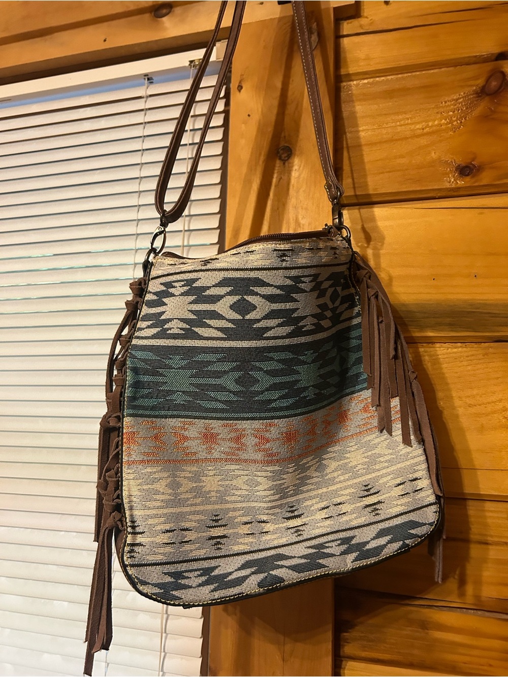 Justin purses with Aztec print and fringe
